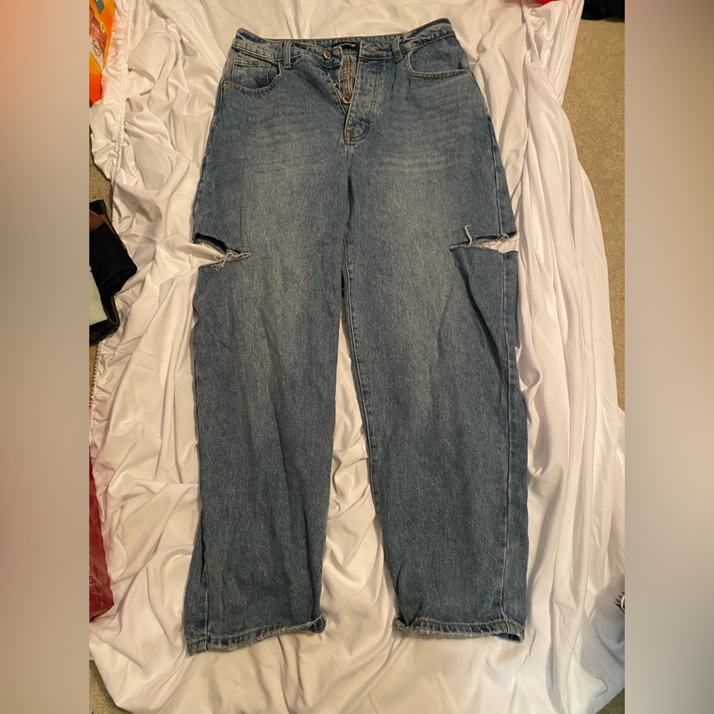 blue jeans with slits on sides